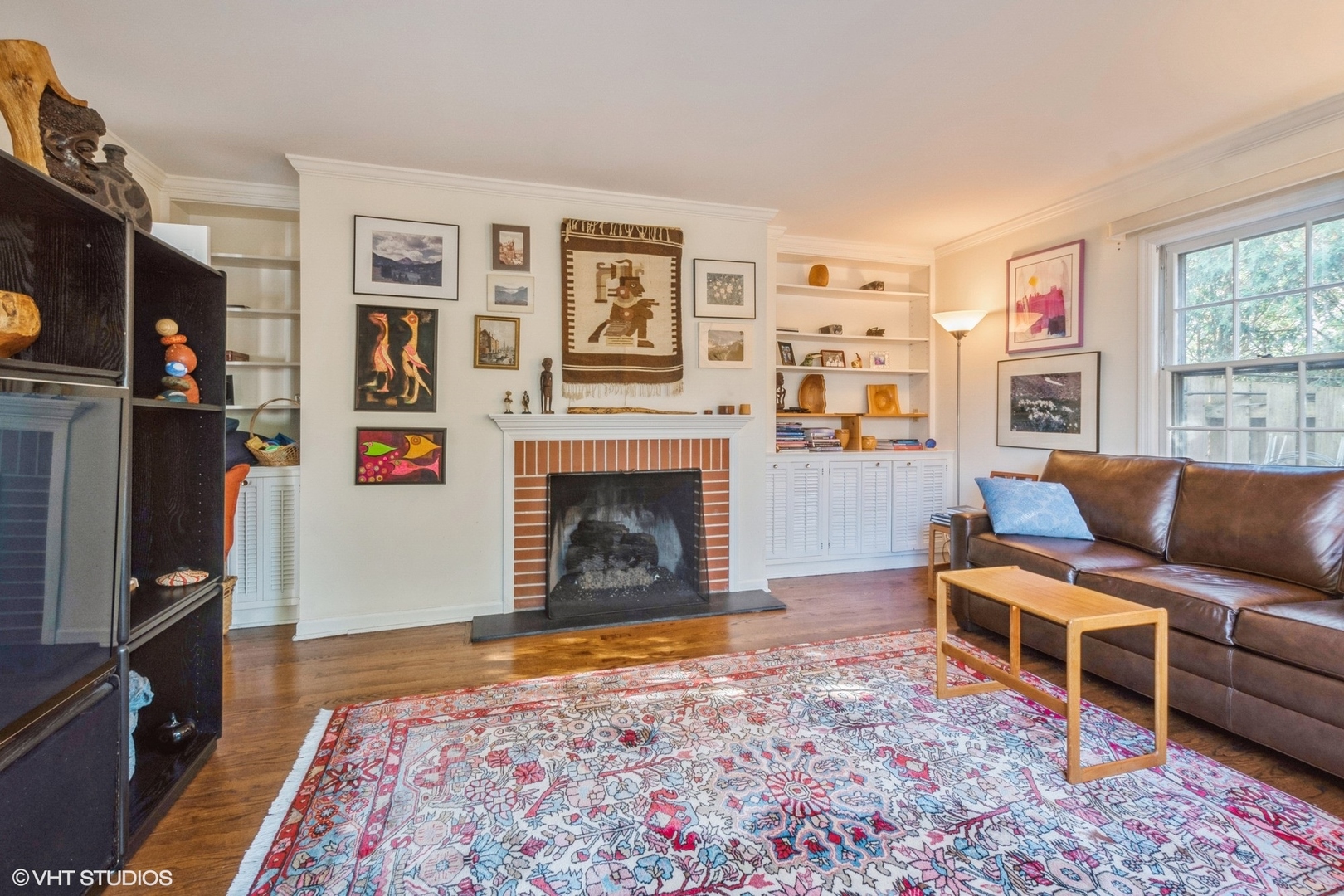 2510 Sheridan Road Evanston, IL 60201 - Photo 6 of 28 a living room with furniture and a fireplace