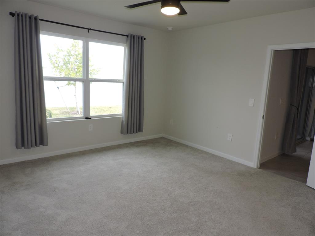 836 Persimmon Place Fort Pierce, FL 34981 - Photo 30 of 78 an empty room with a window