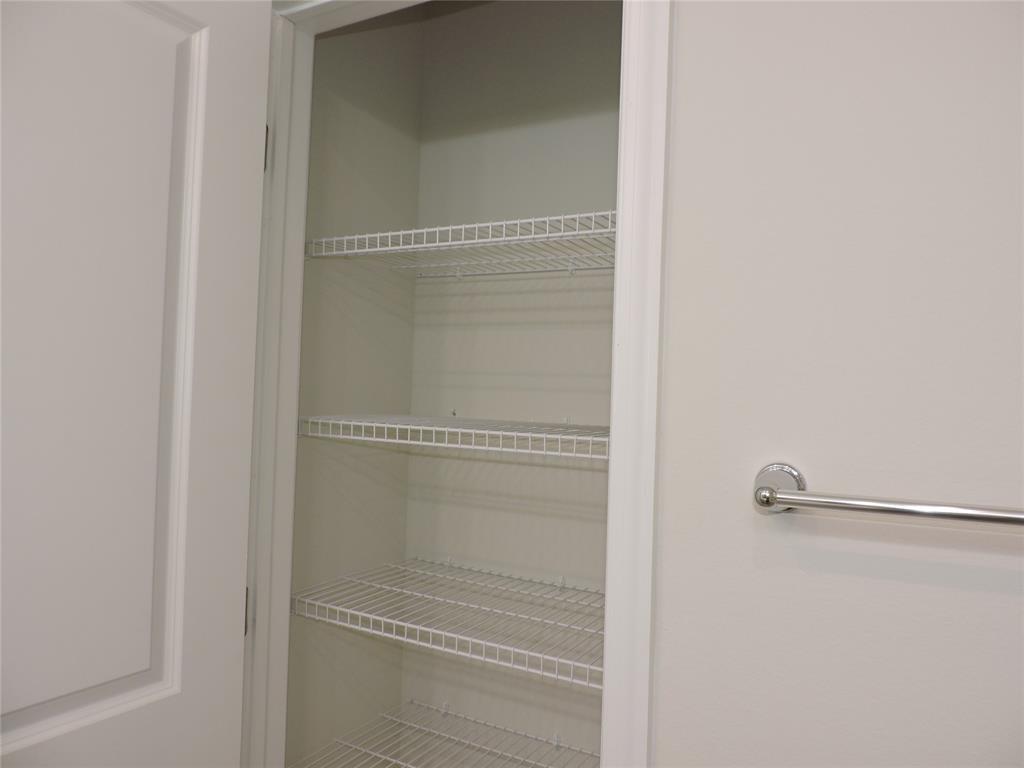 836 Persimmon Place Fort Pierce, FL 34981 - Photo 36 of 78 a bathroom with a glass shower door