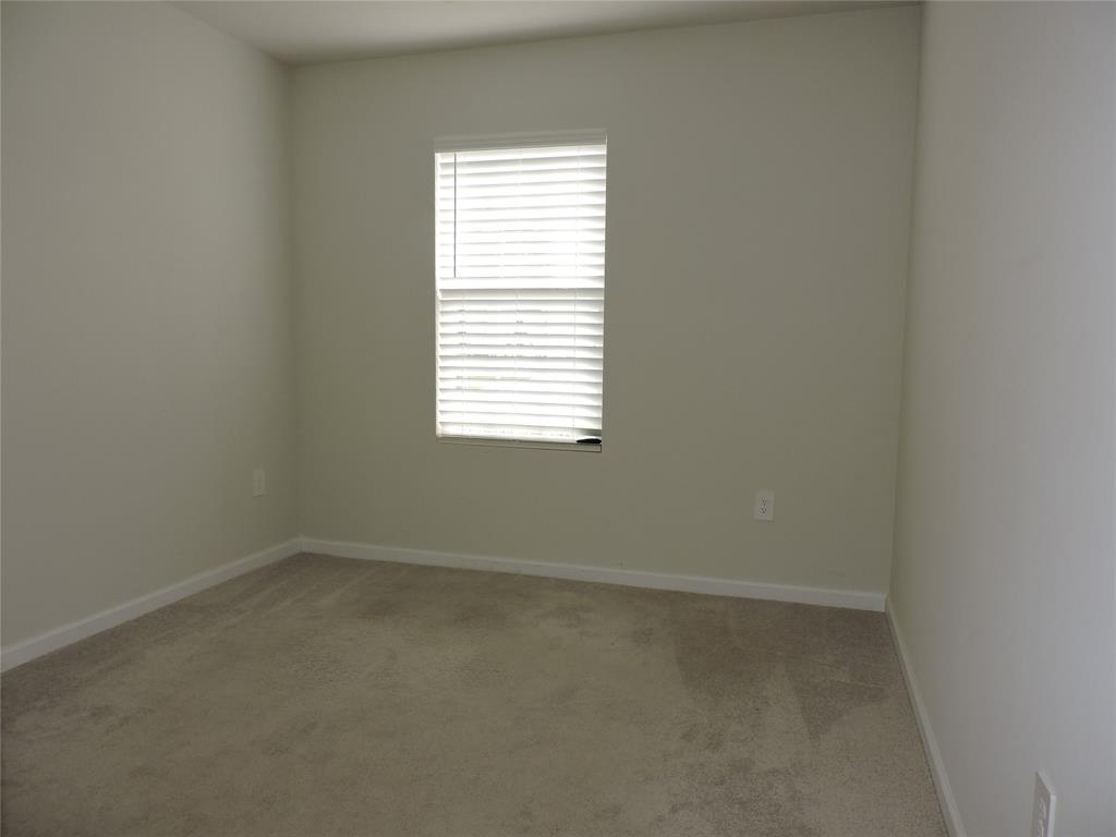 836 Persimmon Place Fort Pierce, FL 34981 - Photo 37 of 78 an empty room with a window