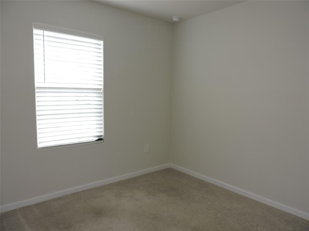 836 Persimmon Place Fort Pierce, FL 34981 - Photo 38 of 78 an empty room with a window