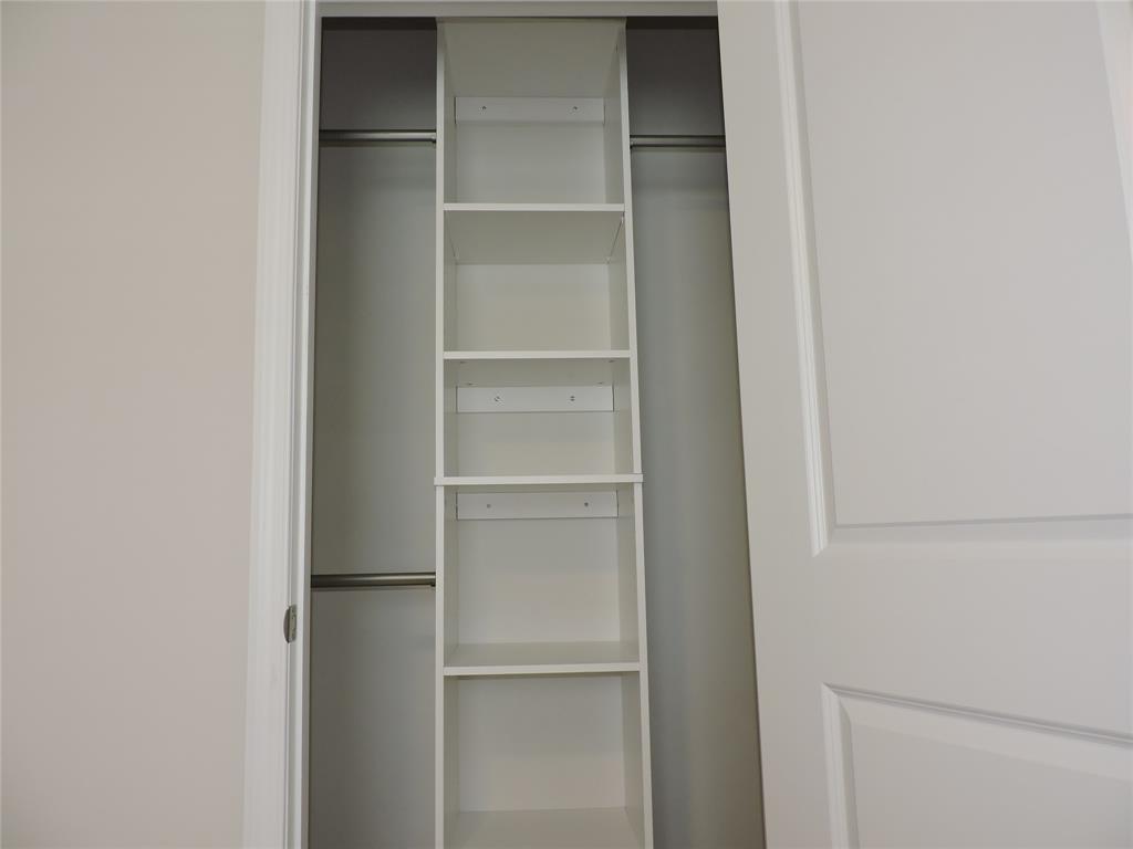 836 Persimmon Place Fort Pierce, FL 34981 - Photo 42 of 78 a view of walk in closet with empty racks