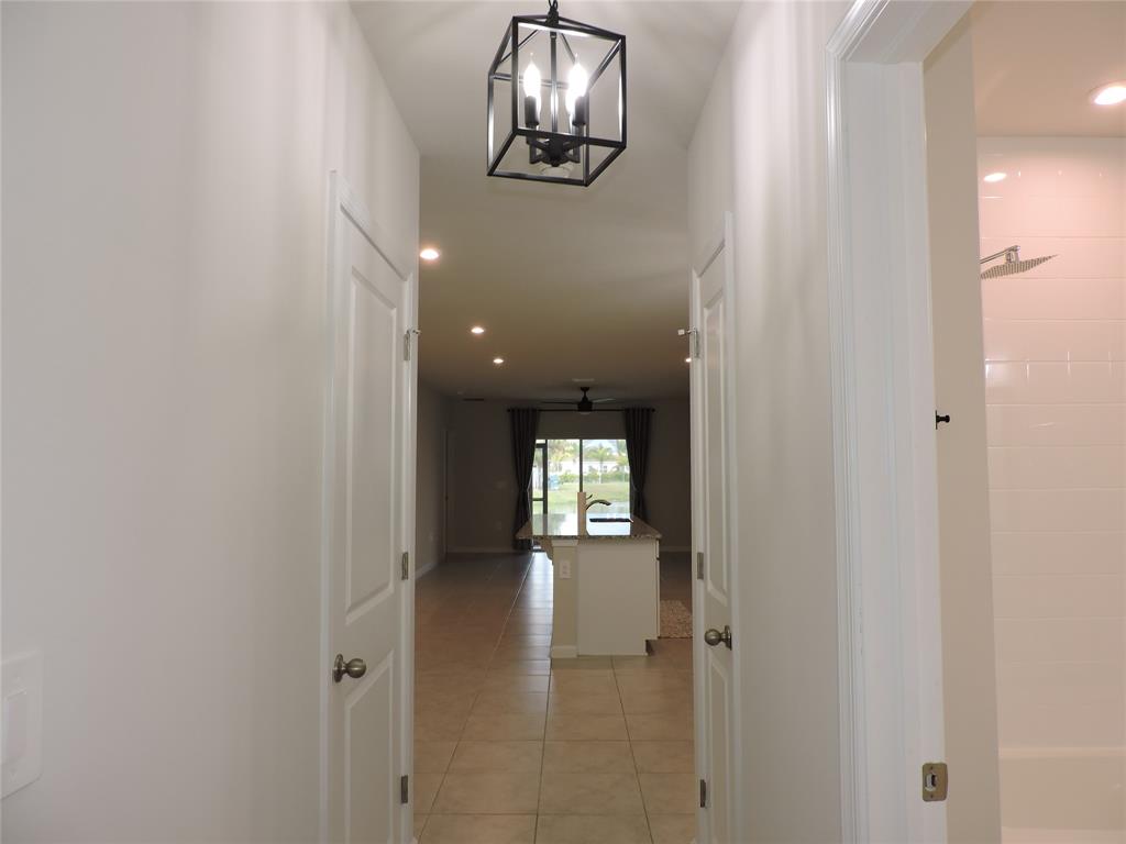 836 Persimmon Place Fort Pierce, FL 34981 - Photo 45 of 78 HALLWAY FROM GUEST BEDROOM #2 AND GUEST BATHROOM