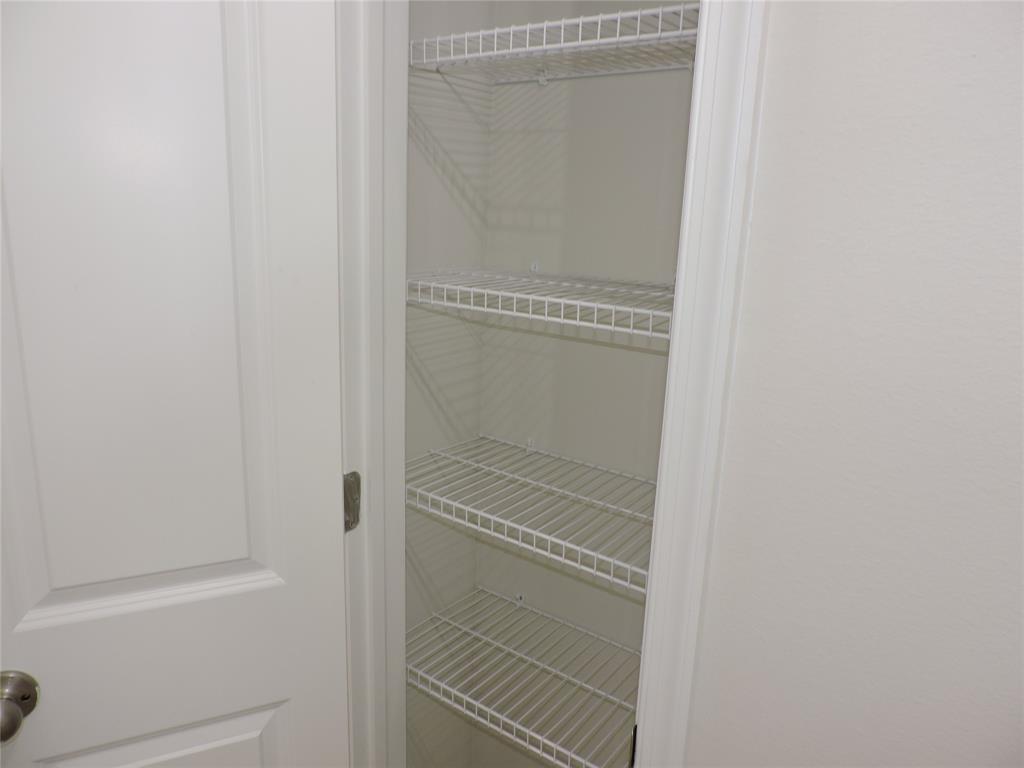 836 Persimmon Place Fort Pierce, FL 34981 - Photo 46 of 78 a bathroom with a glass shower door