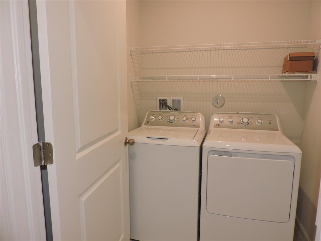 836 Persimmon Place Fort Pierce, FL 34981 - Photo 52 of 78 a utility room with dryer and washer