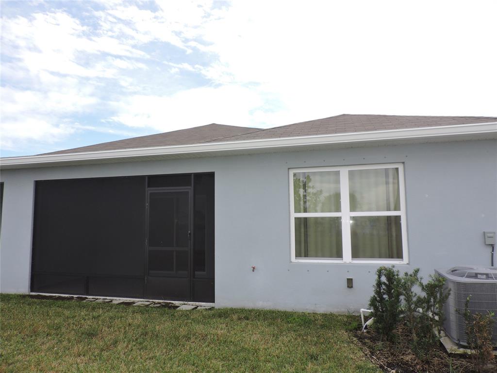836 Persimmon Place Fort Pierce, FL 34981 - Photo 59 of 78 a front view of a house