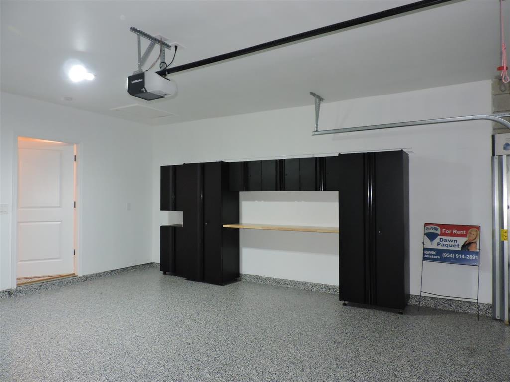 836 Persimmon Place Fort Pierce, FL 34981 - Photo 62 of 78 2 CAR GARAGE WITH HUSKY STORAGE SYSTEM