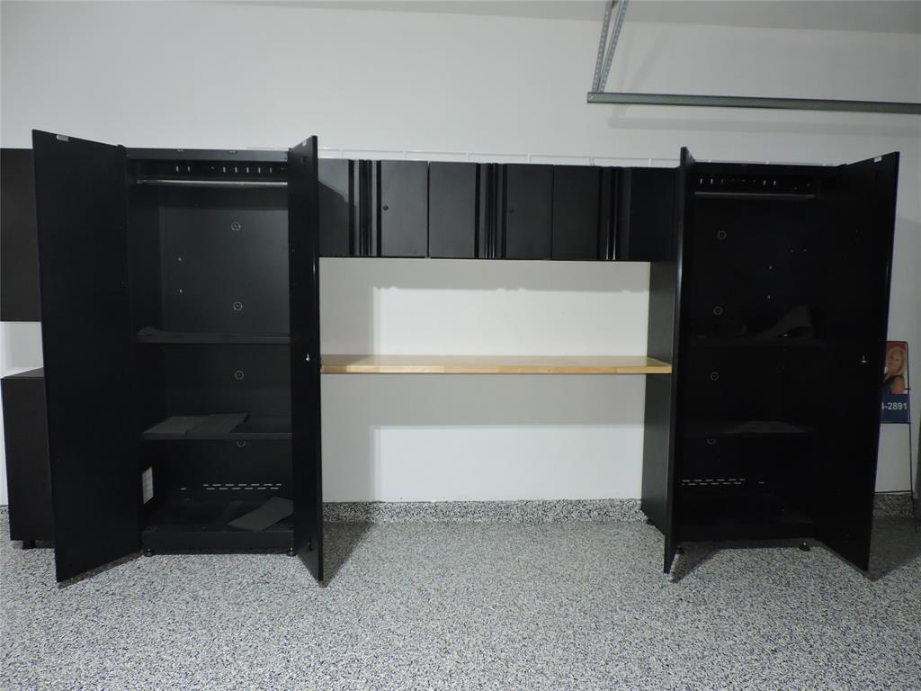 836 Persimmon Place Fort Pierce, FL 34981 - Photo 63 of 78 2 CAR GARAGE WITH HUSKY STORAGE SYSTEM