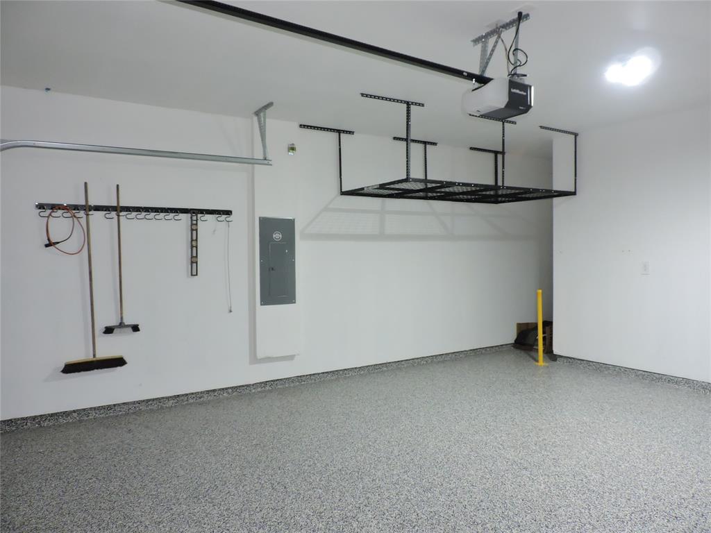 836 Persimmon Place Fort Pierce, FL 34981 - Photo 64 of 78 2 CAR GARGE WITH HANGING STORAGE