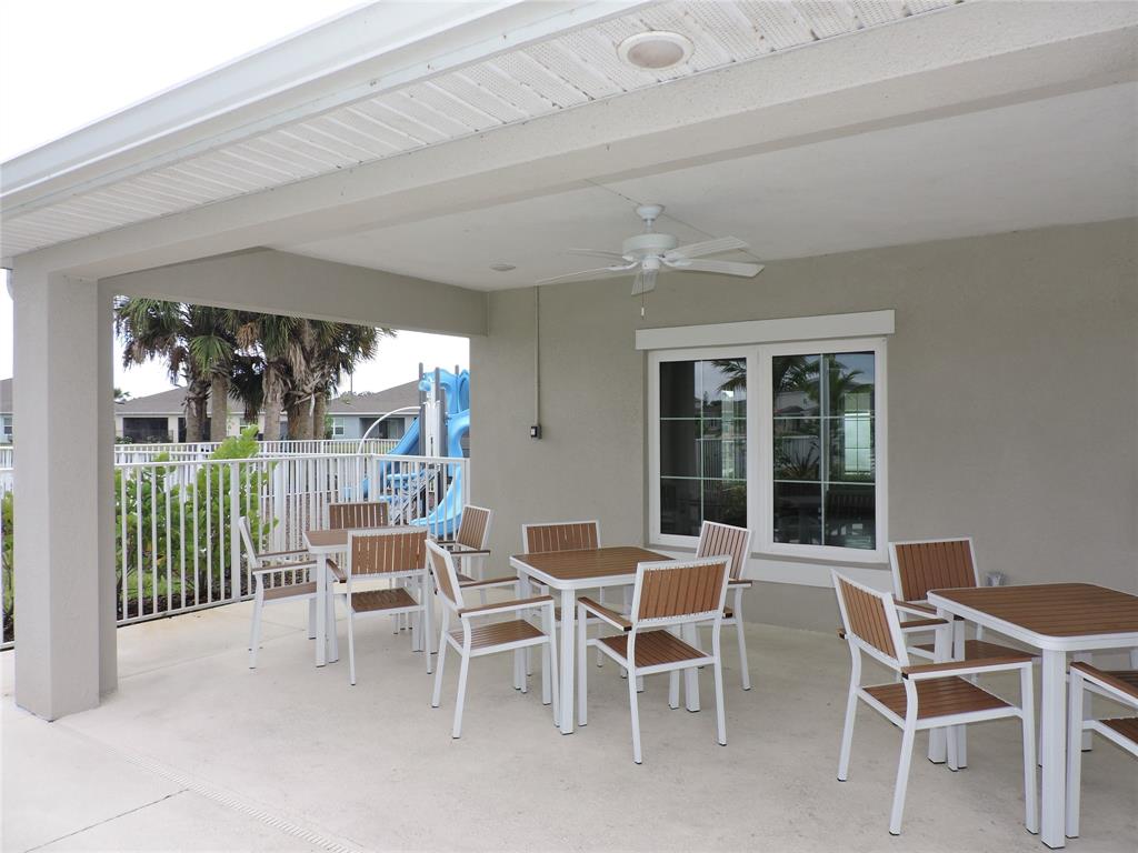 836 Persimmon Place Fort Pierce, FL 34981 - Photo 77 of 78 COMMUNITY CLUBHOUSE & POOLSIDE DINING