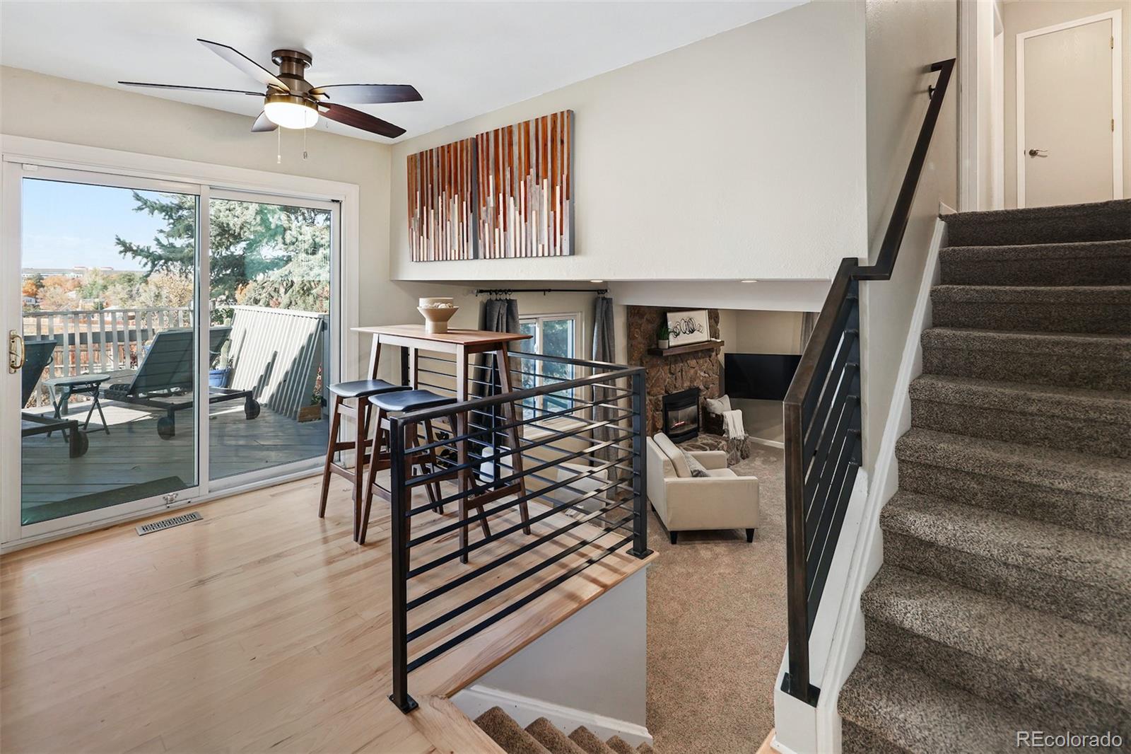 10499 Newcombe Street Westminster, CO 80021 - Photo 13 of 33 a view of entryway and hall with wooden floor