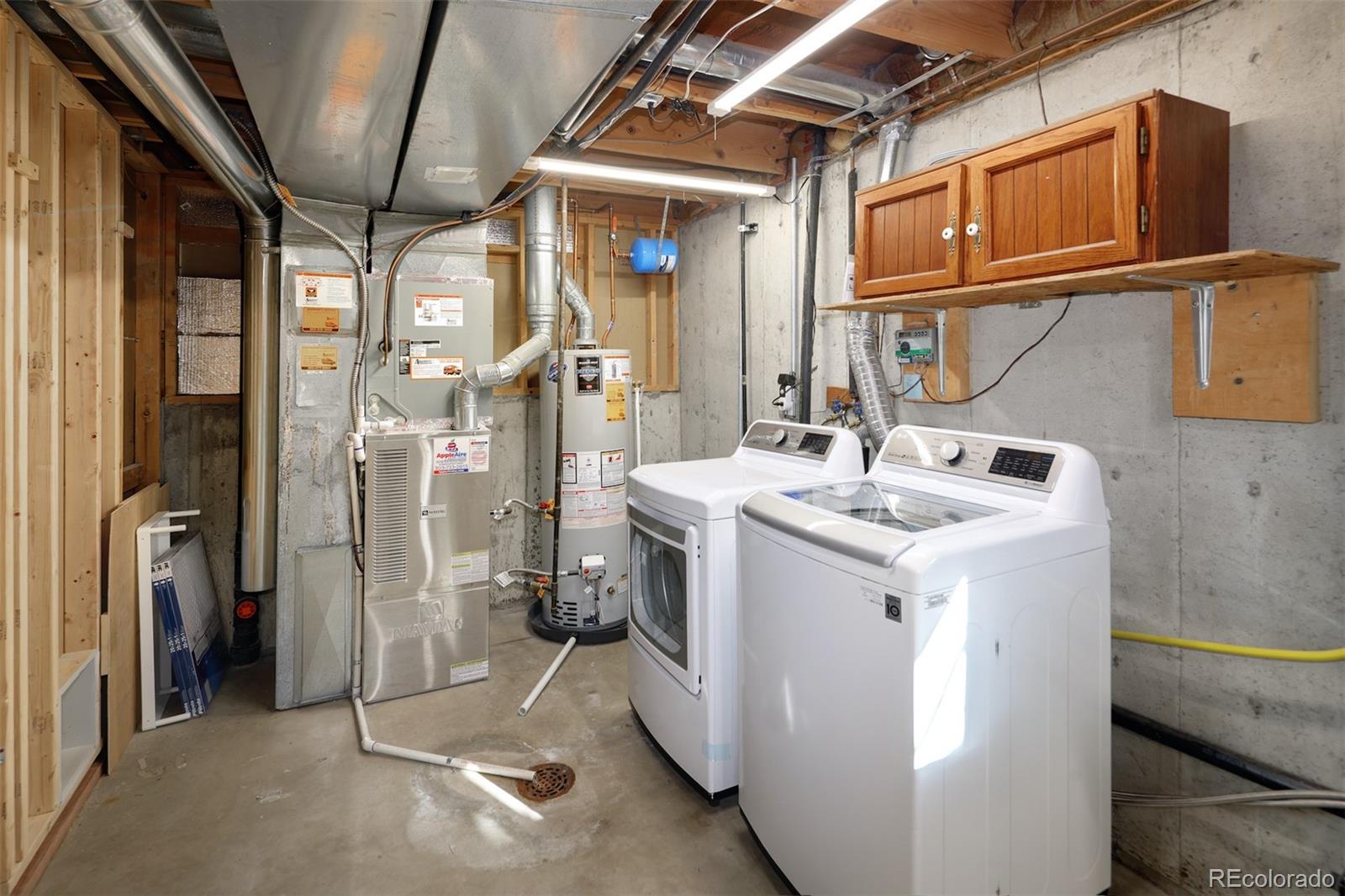 10499 Newcombe Street Westminster, CO 80021 - Photo 26 of 33 a utility room with dryer and washer