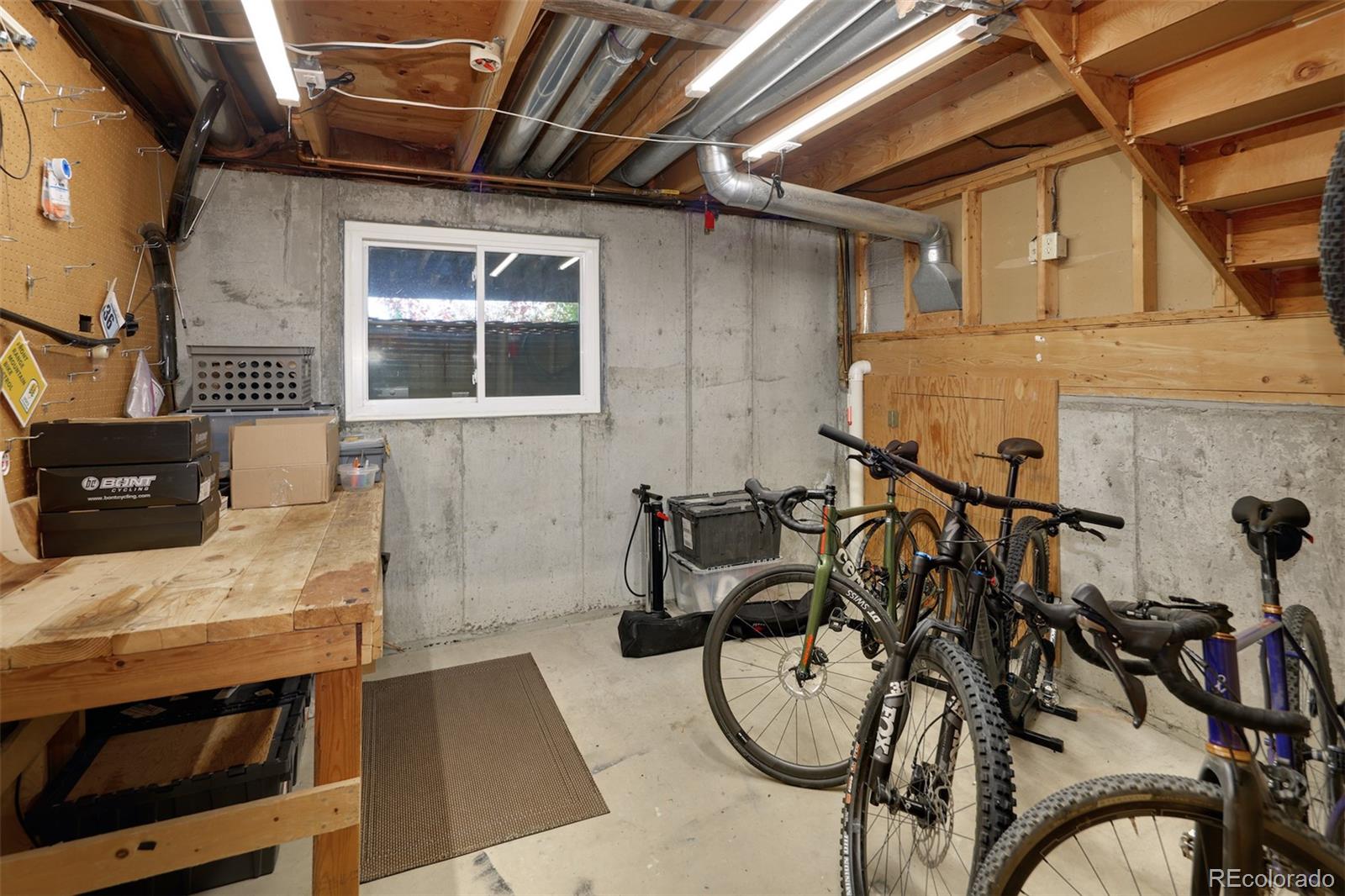 10499 Newcombe Street Westminster, CO 80021 - Photo 28 of 33 a bathroom with a sink and a mirror