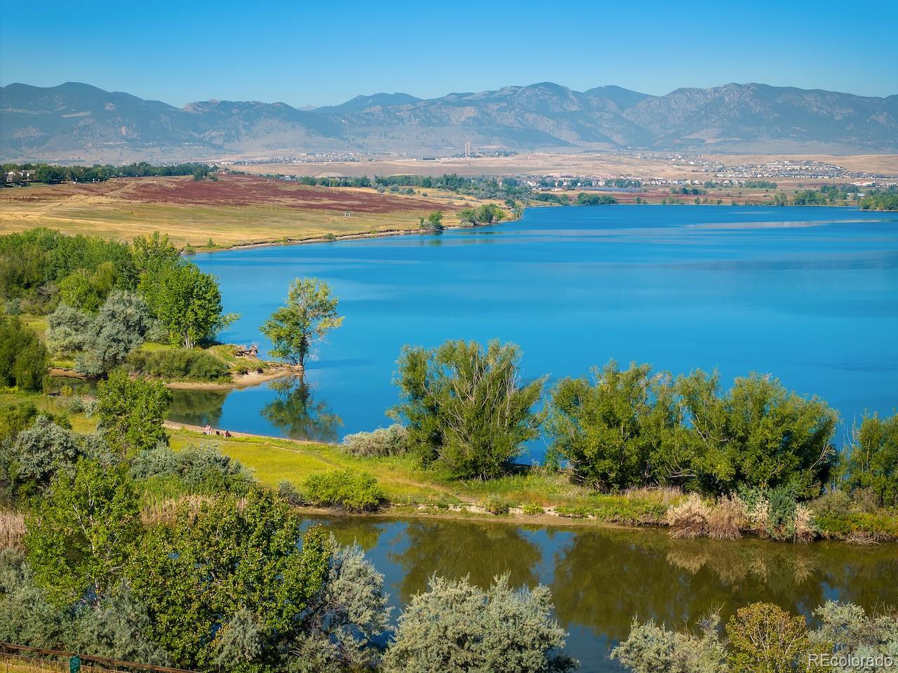 10499 Newcombe Street Westminster, CO 80021 - Photo 9 of 33 a view of lake with mountain