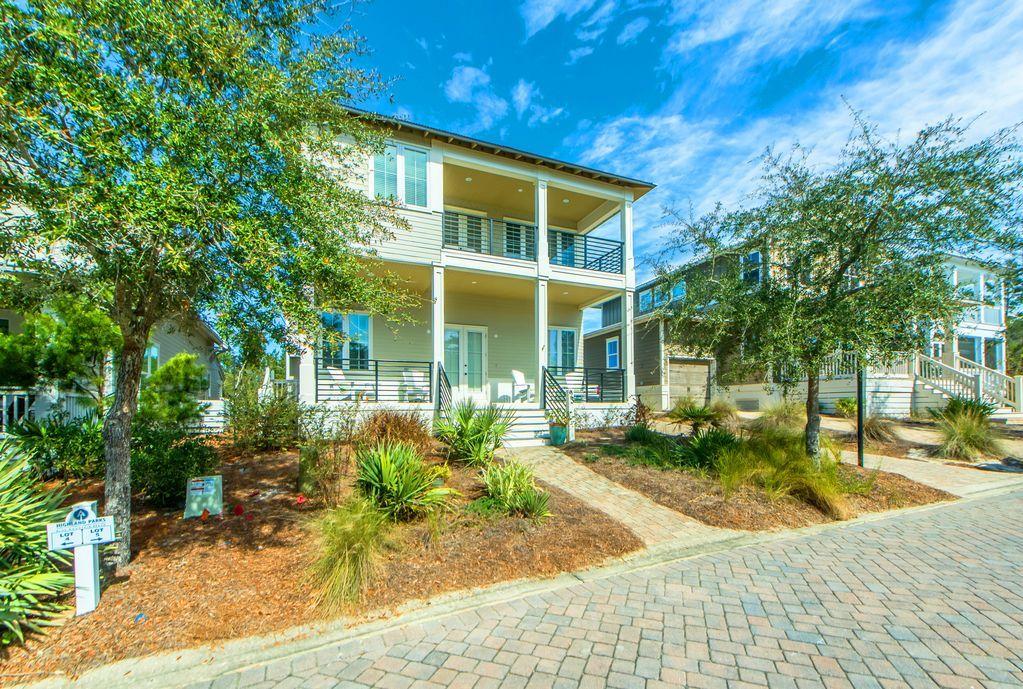 93 Gulfview Circle Santa Rosa Beach, FL 32459 - Photo 1 of 55 a view of a house with backyard and sitting area