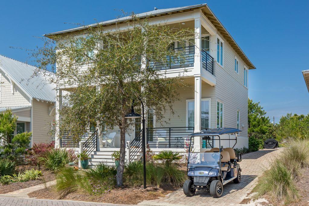 93 Gulfview Circle Santa Rosa Beach, FL 32459 - Photo 2 of 55 a view of a house with backyard and sitting area