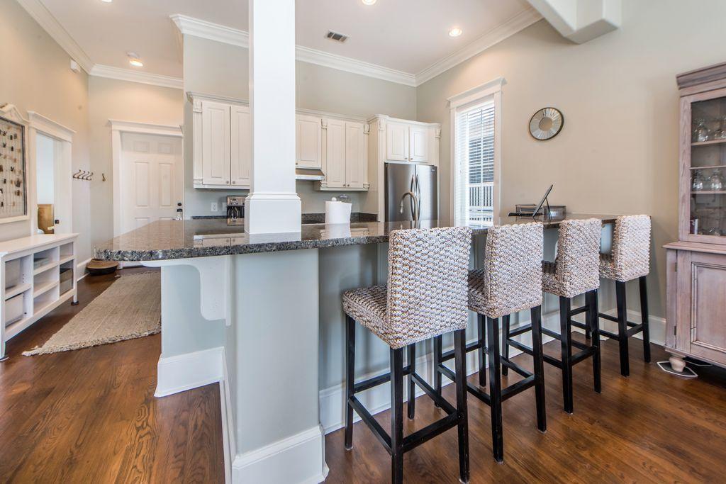 93 Gulfview Circle Santa Rosa Beach, FL 32459 - Photo 18 of 55 a large kitchen with a table and chairs