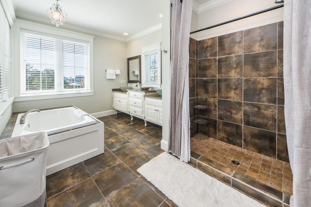 93 Gulfview Circle Santa Rosa Beach, FL 32459 - Photo 31 of 55 a bathroom with a tub shower and sink