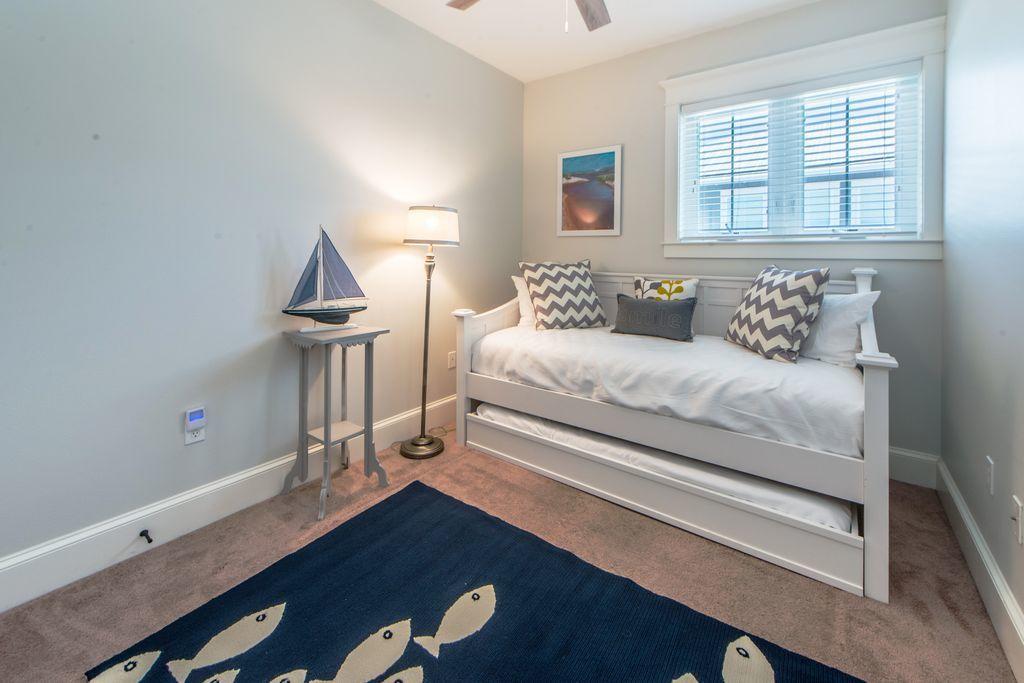 93 Gulfview Circle Santa Rosa Beach, FL 32459 - Photo 41 of 55 a bedroom with a bed and a desk