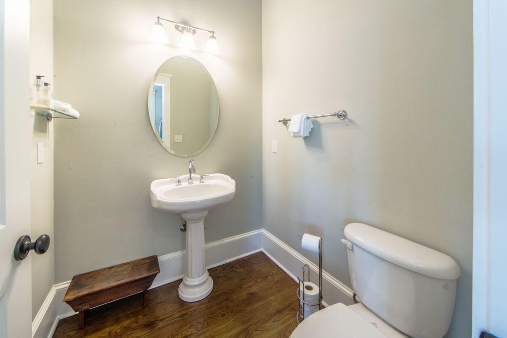 93 Gulfview Circle Santa Rosa Beach, FL 32459 - Photo 54 of 55 a bathroom with a toilet a sink and a mirror