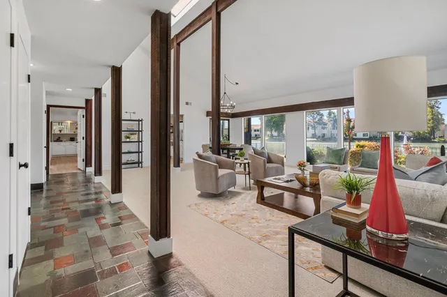 a bathroom with a double vanity sink mirror and toilet