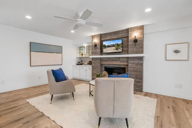 a kitchen with stainless steel appliances a sink stove and cabinets