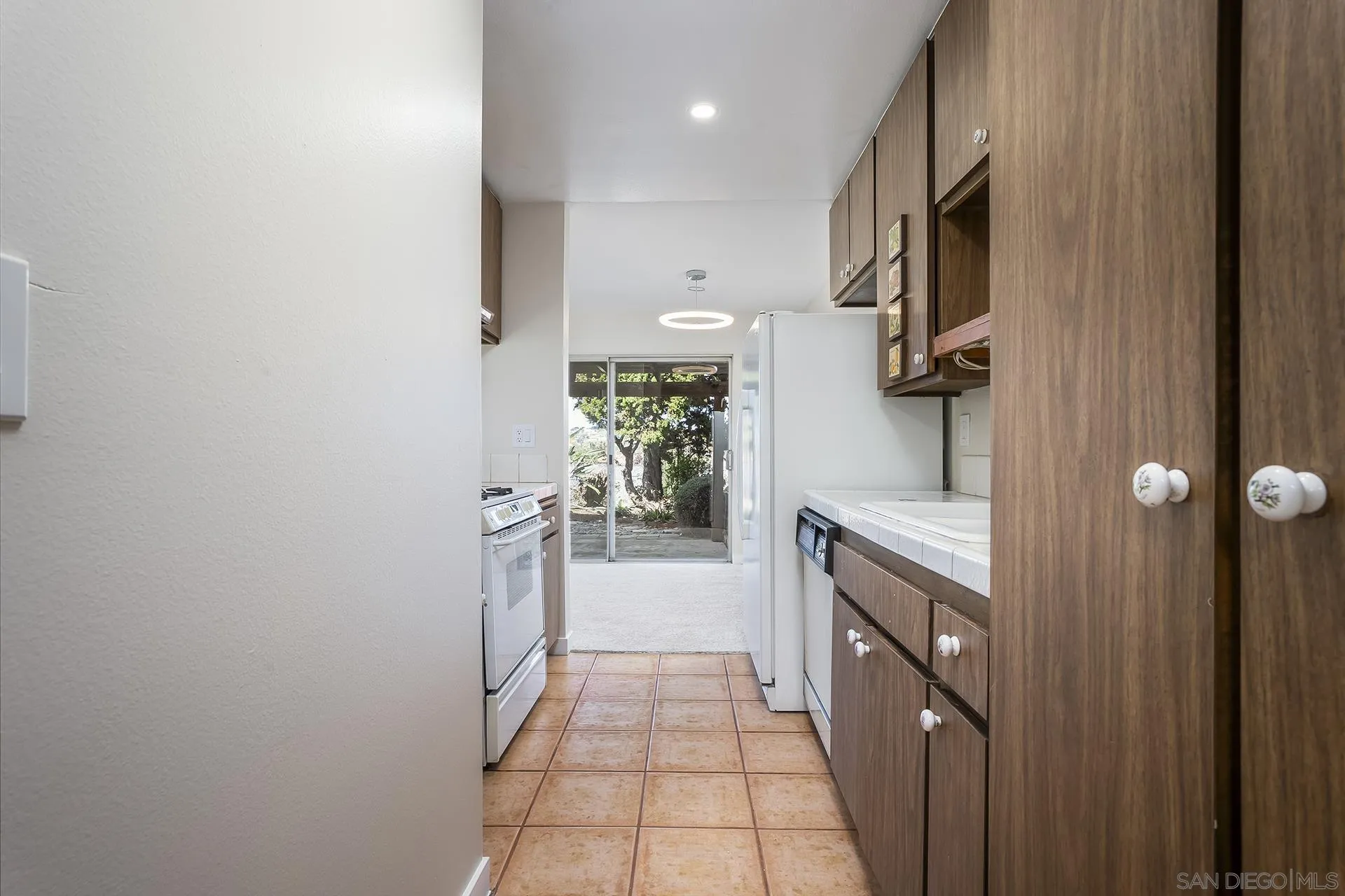 2014 Terraspiro Avenue Spring Valley, CA 91977 - Photo 11 of 28 a bathroom with a sink and mirror