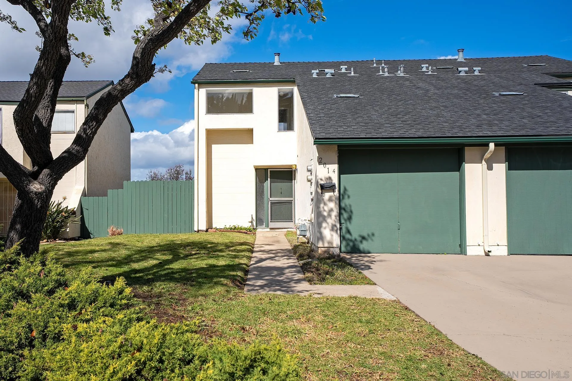 2014 Terraspiro Avenue Spring Valley, CA 91977 - Photo 2 of 28 a front view of a house with a yard