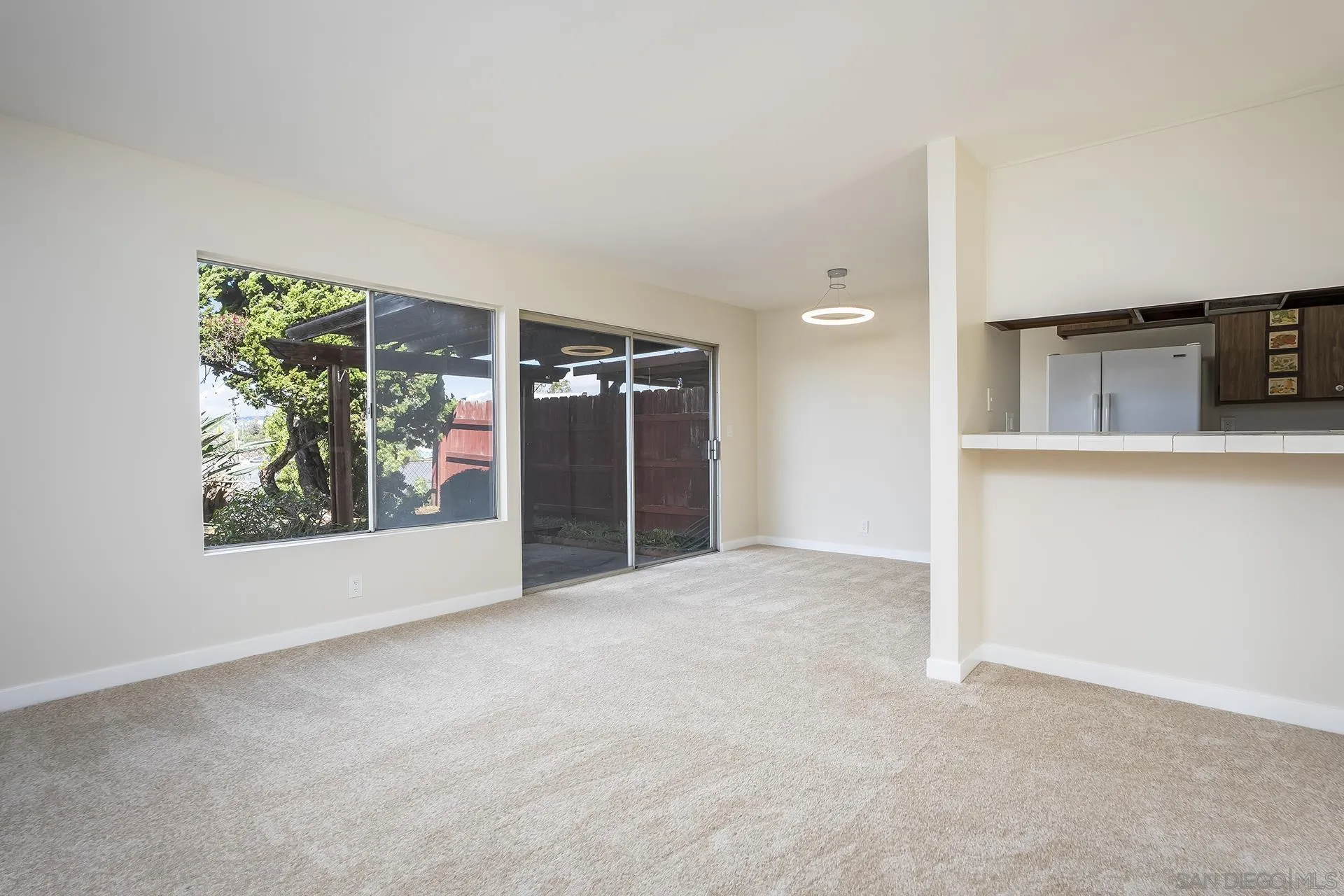 2014 Terraspiro Avenue Spring Valley, CA 91977 - Photo 5 of 28 an empty room with windows and closet