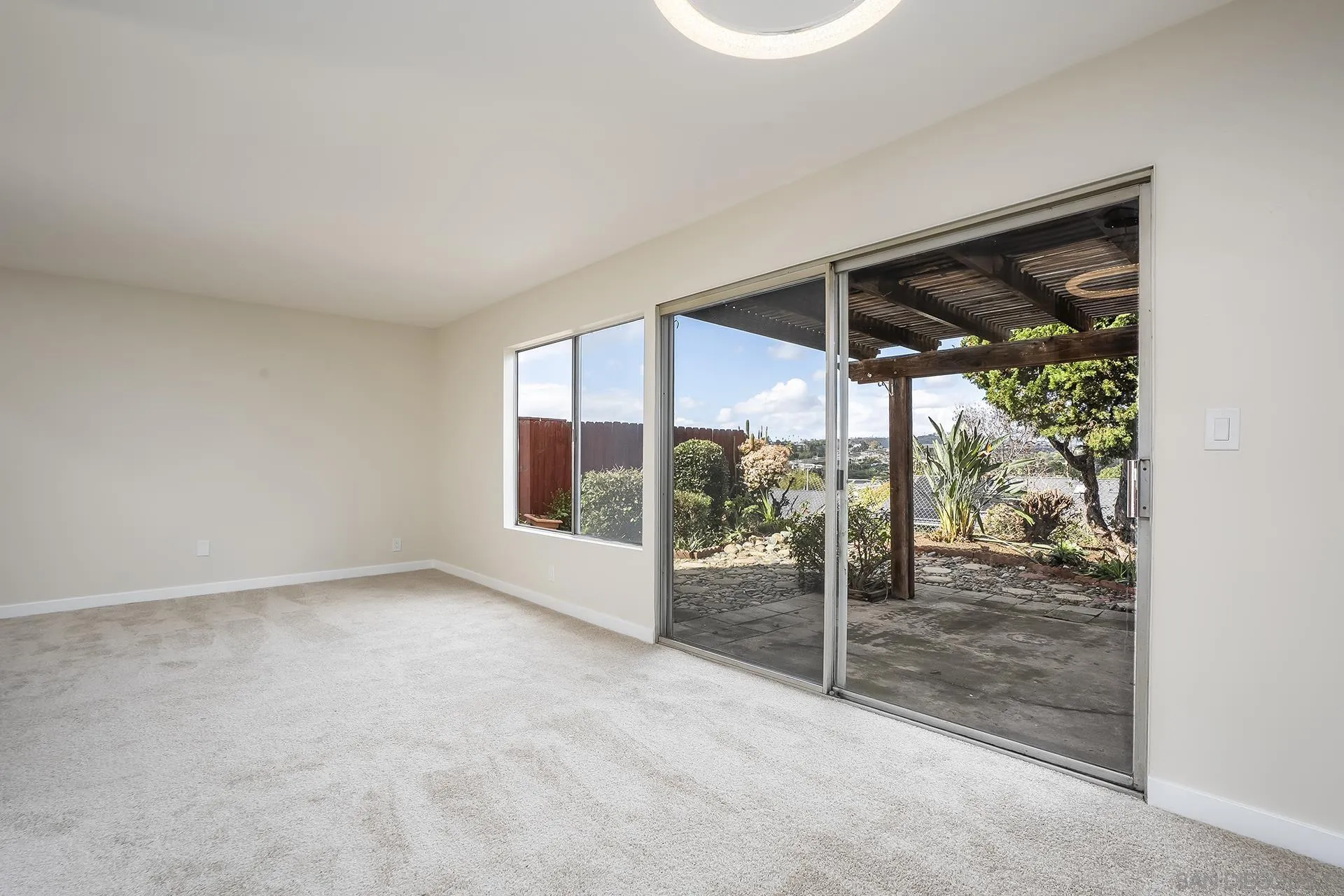 2014 Terraspiro Avenue Spring Valley, CA 91977 - Photo 9 of 28 a view of a room with a large window