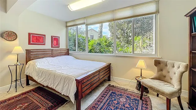 a living room with furniture and flat screen tv