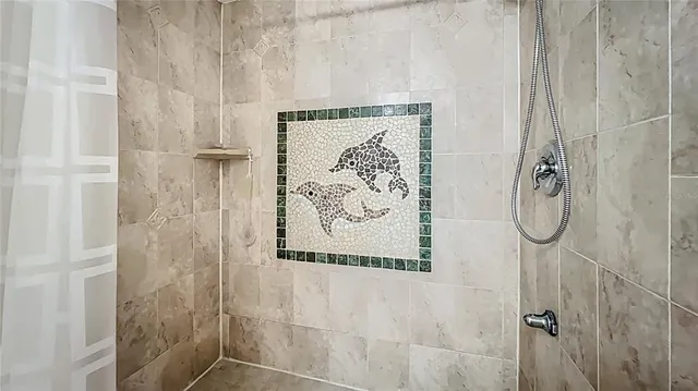 a view of backyard with swimming pool and sitting area