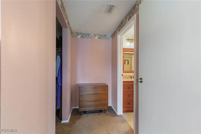 a room that has a bed and a window