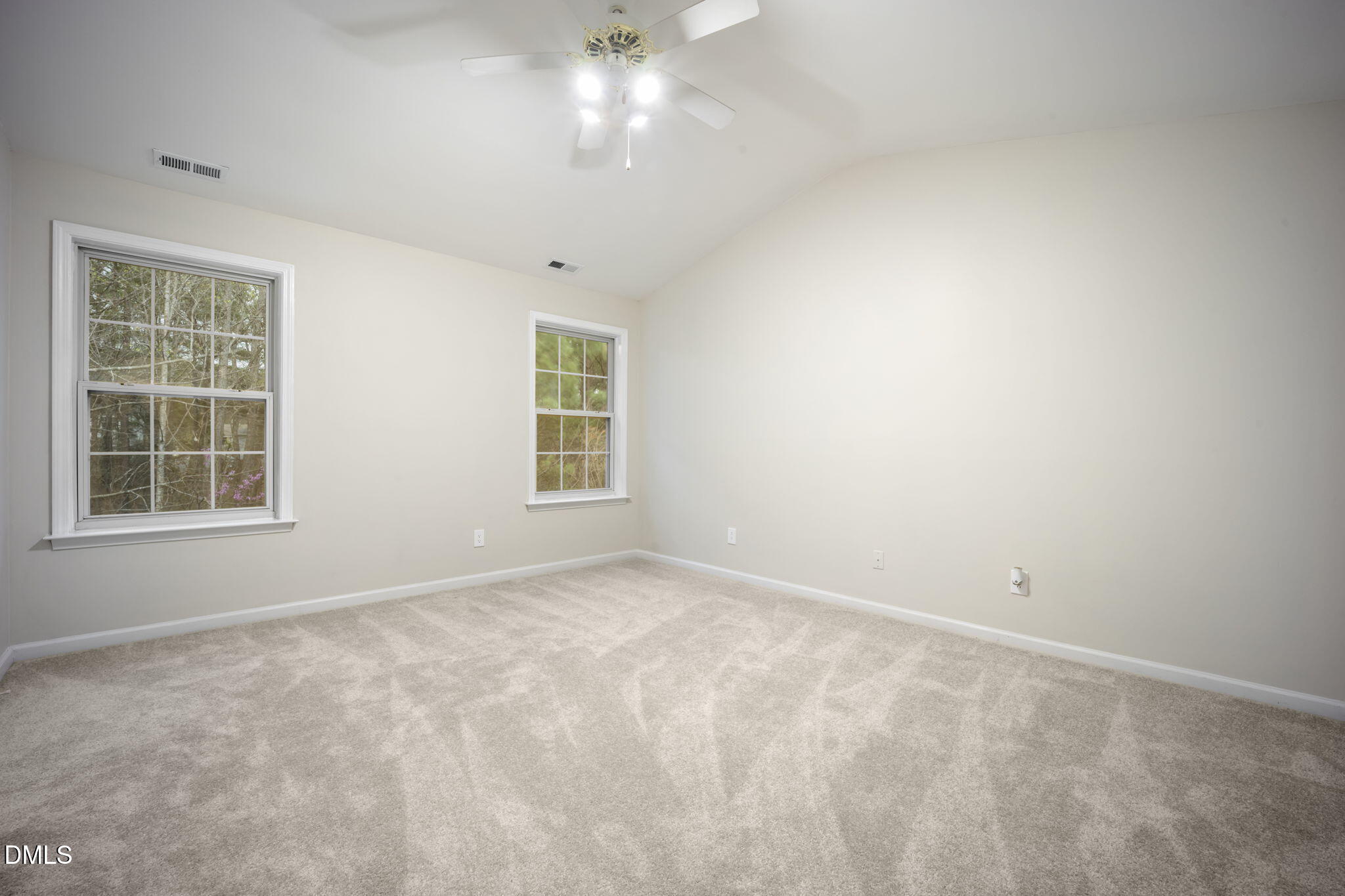 900 Spring Meadow Drive Durham, NC 27713 - Photo 14 of 26 a view of an empty room with a window