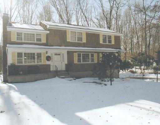 11 Conant Road Ridgefield, CT 06877 - Photo 1 of 1 a front view of a house with a yard