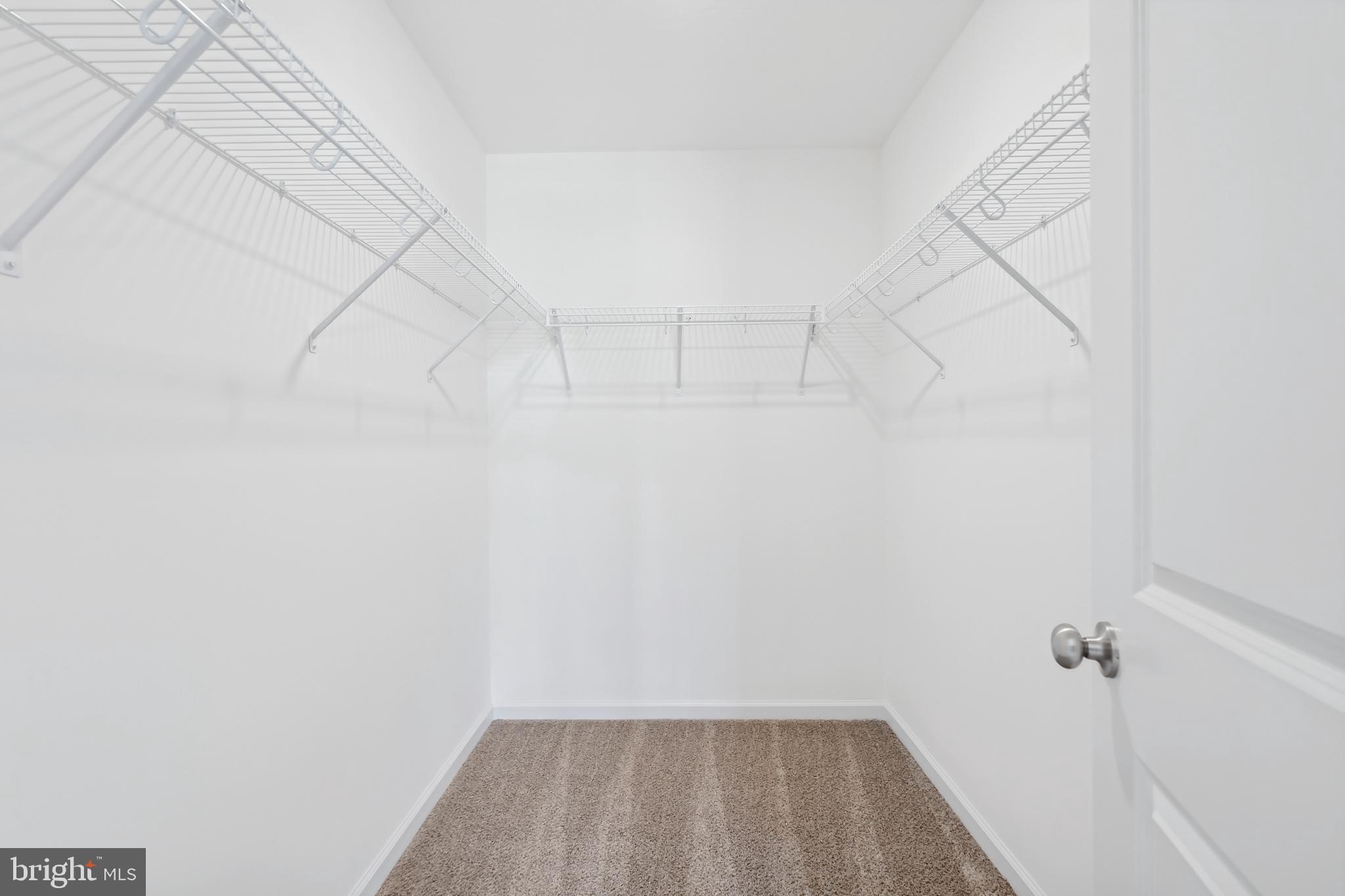 170 Piedmont Way, Unit 98 Hanover, PA 17331 - Photo 17 of 23 a view of a room with racks on the wall