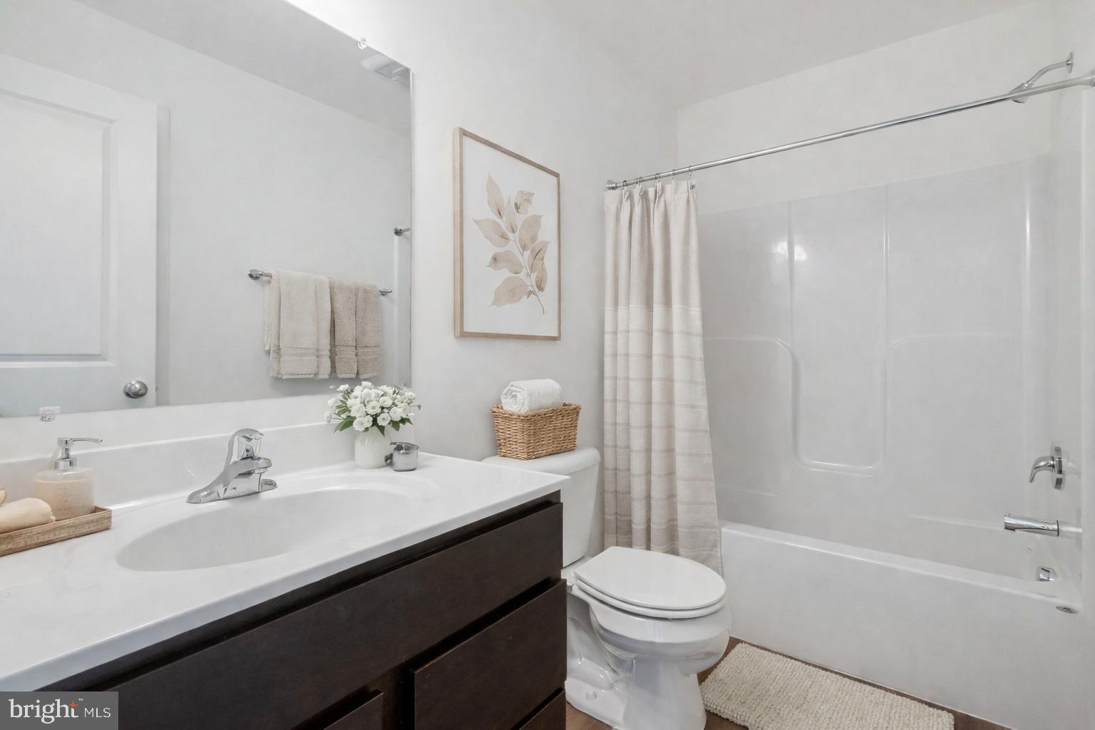170 Piedmont Way, Unit 98 Hanover, PA 17331 - Photo 19 of 23 a bathroom with a sink a toilet and shower