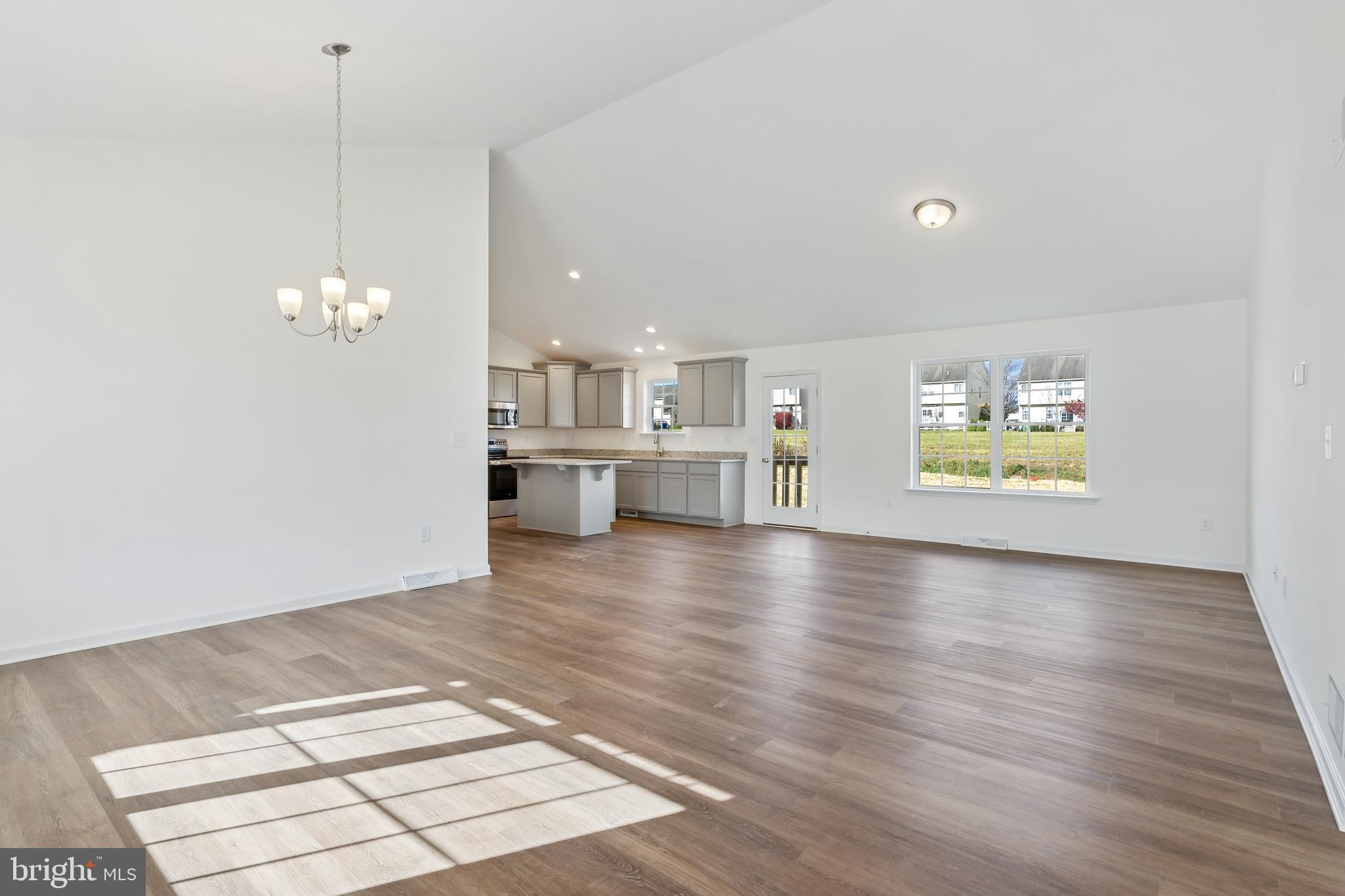 170 Piedmont Way, Unit 98 Hanover, PA 17331 - Photo 5 of 23 a view of a kitchen with a dishwasher cabinets and wooden floor
