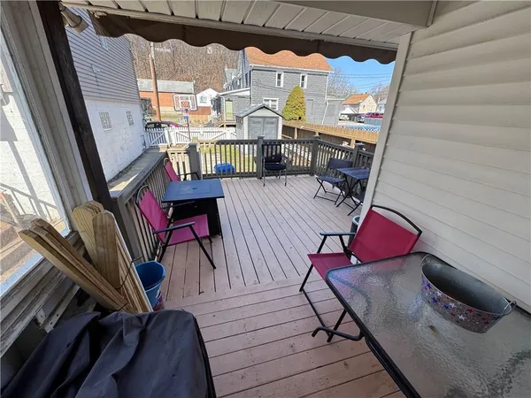 a view of balcony with furniture and rug