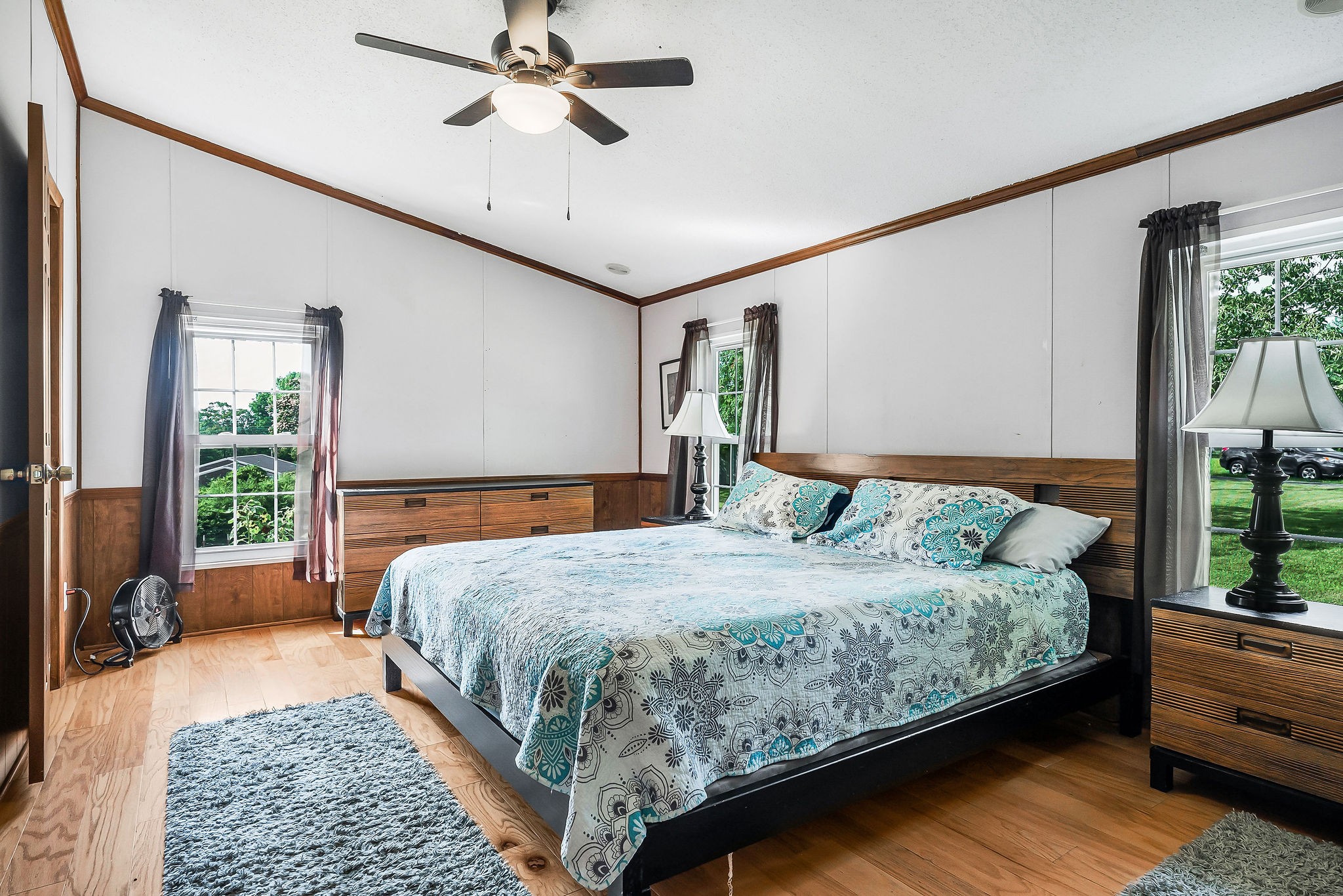 227 B A R Road Baxter, TN 38544 - Photo 12 of 52 a bedroom with a large bed and a chandelier fan