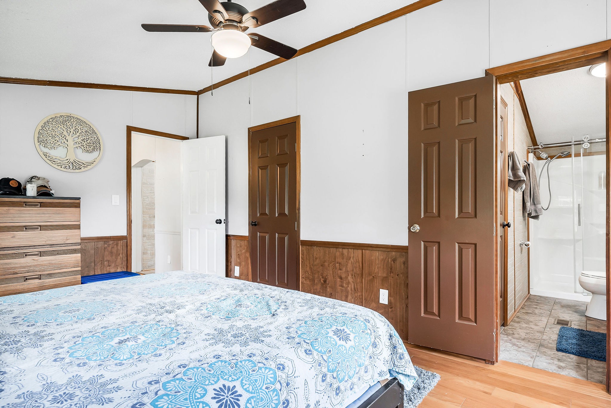 227 B A R Road Baxter, TN 38544 - Photo 13 of 52 a bedroom with a bed and a chandelier