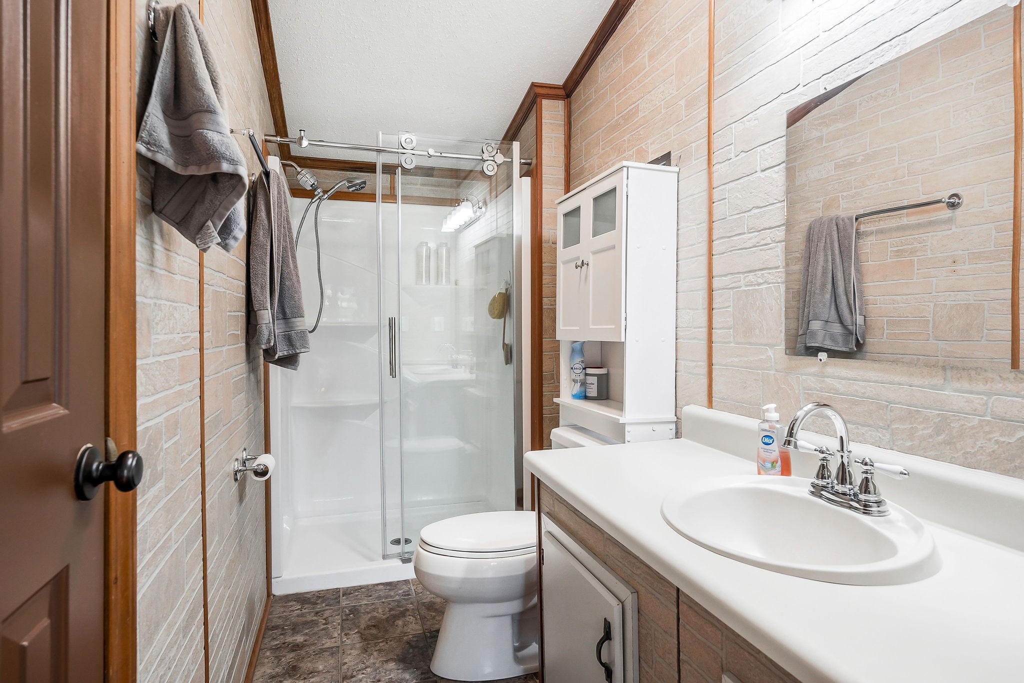 227 B A R Road Baxter, TN 38544 - Photo 15 of 52 a bathroom with a granite countertop sink toilet and shower