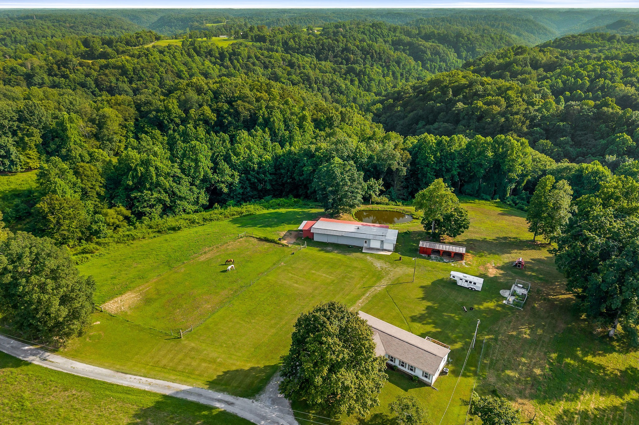 227 B A R Road Baxter, TN 38544 - Photo 2 of 52 a aerial view of a house with a yard