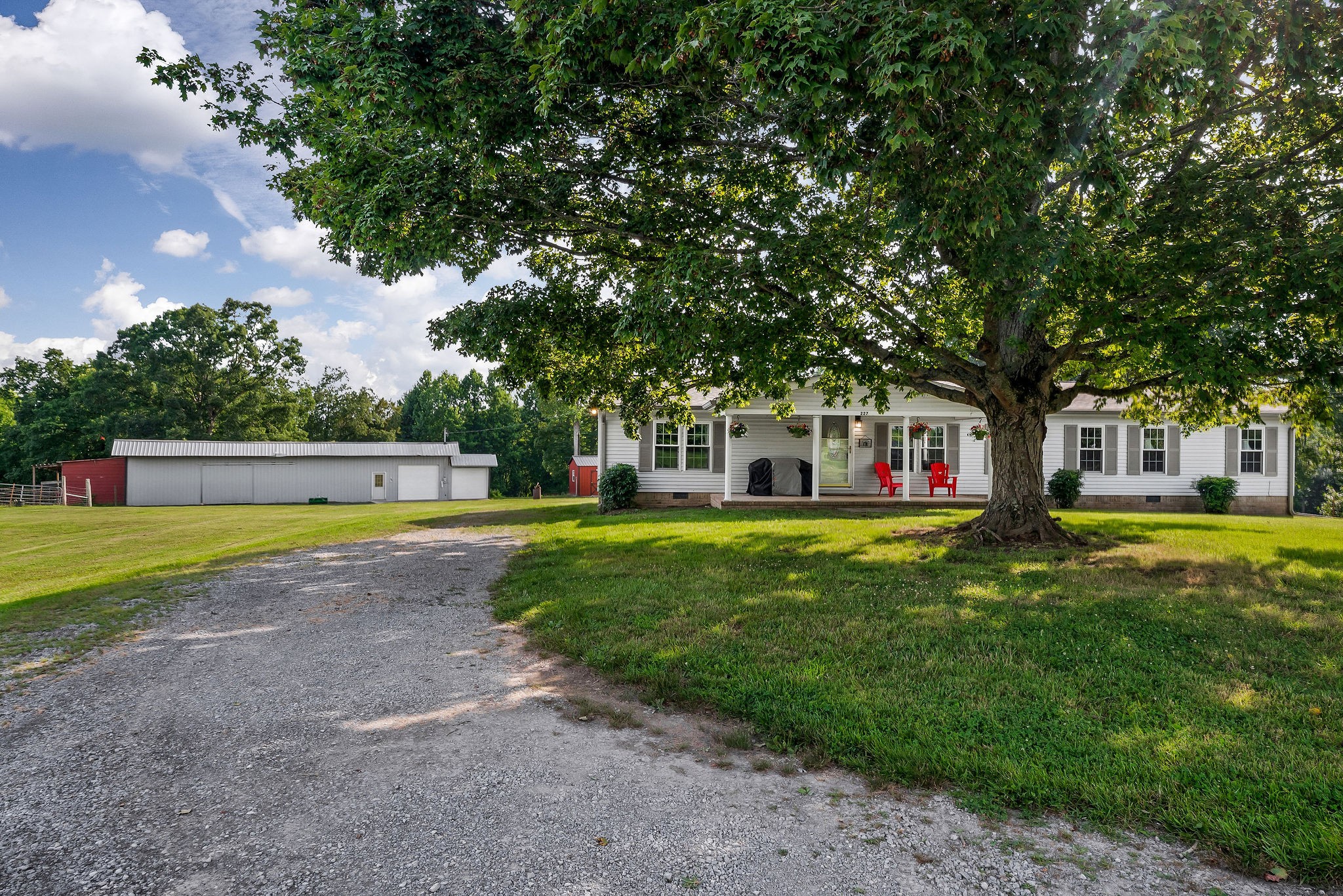 227 B A R Road Baxter, TN 38544 - Photo 38 of 52 a front view of a house with swimming pool and yard