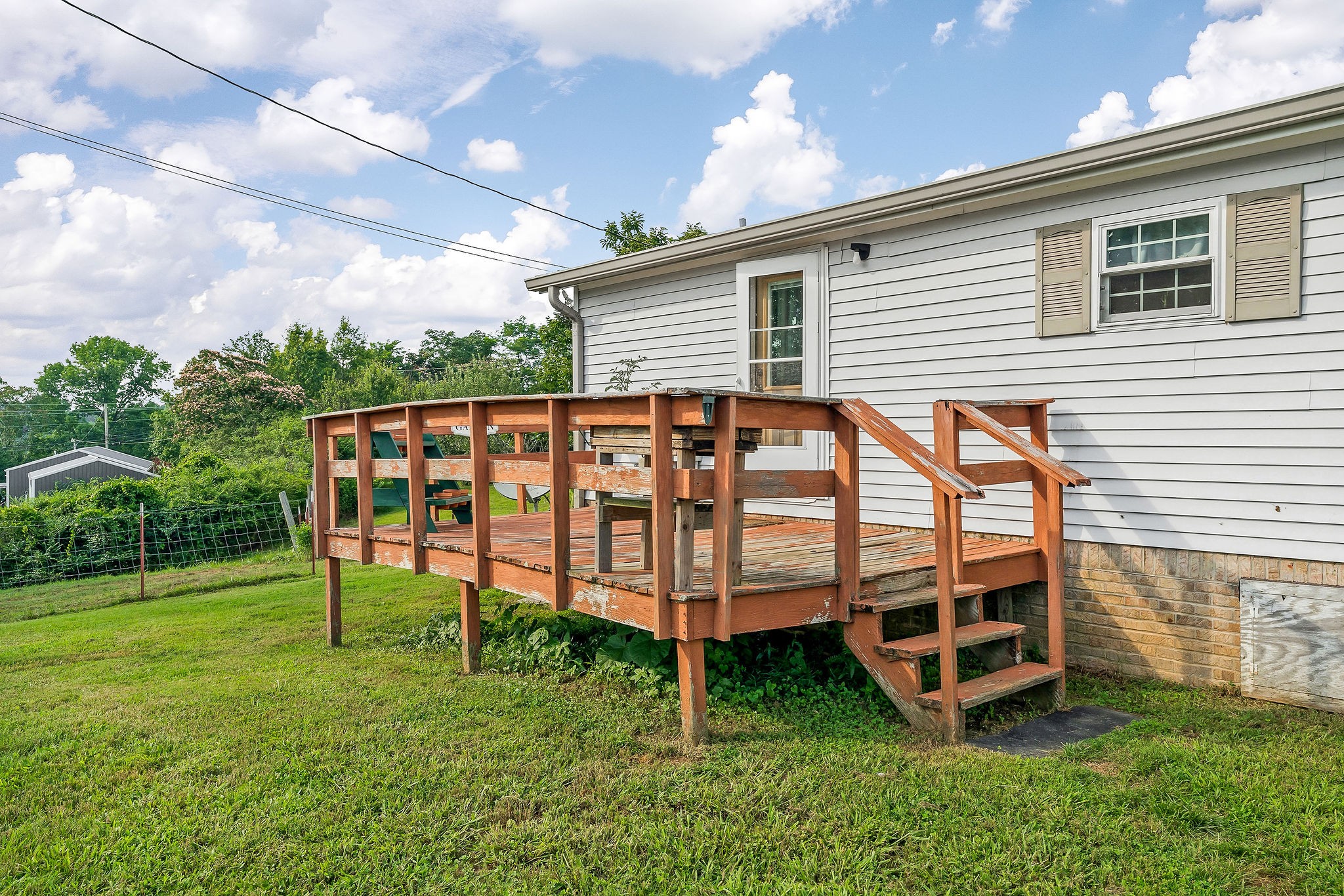 227 B A R Road Baxter, TN 38544 - Photo 41 of 52 a view of a house with a yard and sitting area