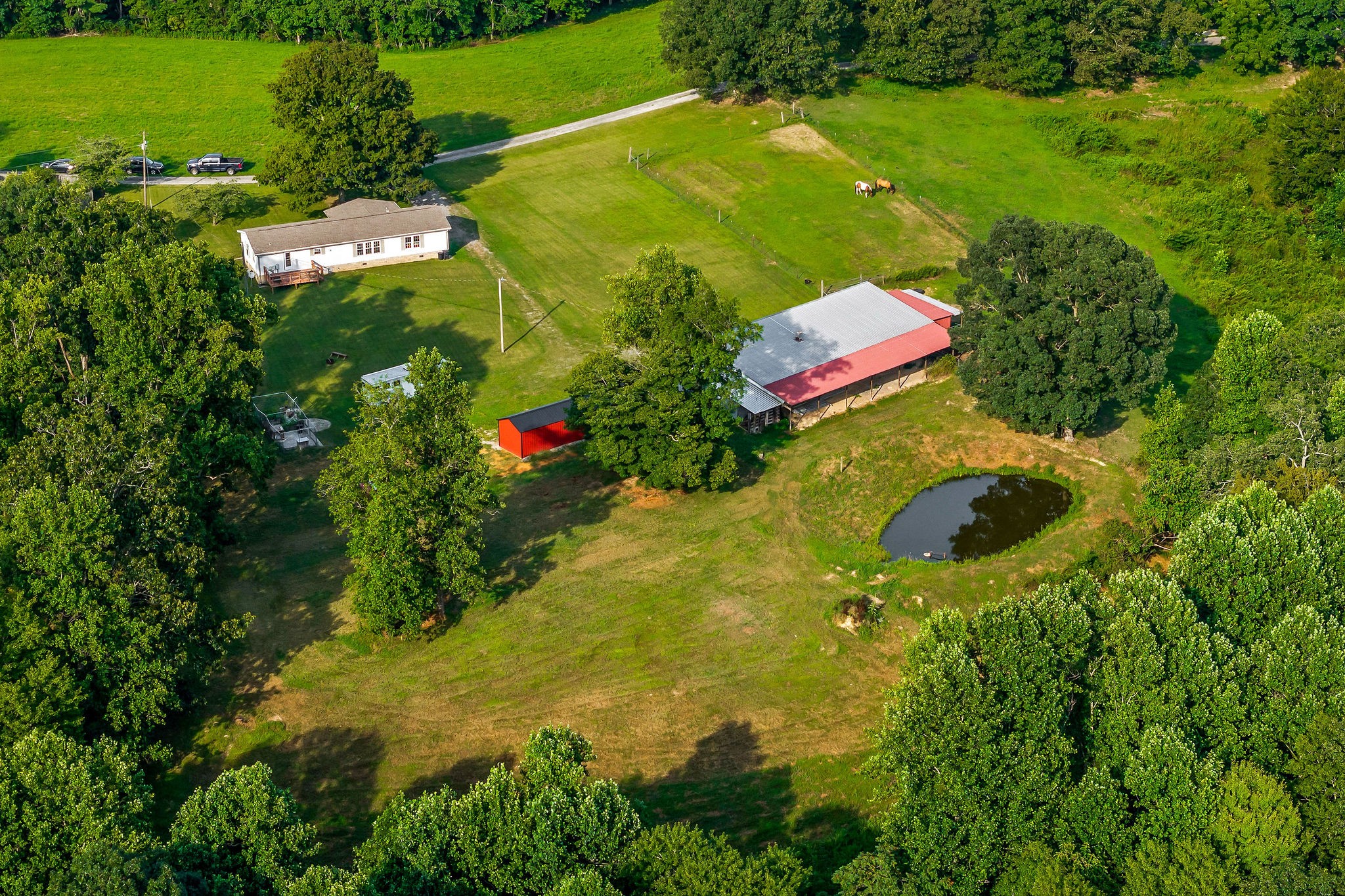 227 B A R Road Baxter, TN 38544 - Photo 48 of 52 an aerial view of a residential houses with yard and swimming pool