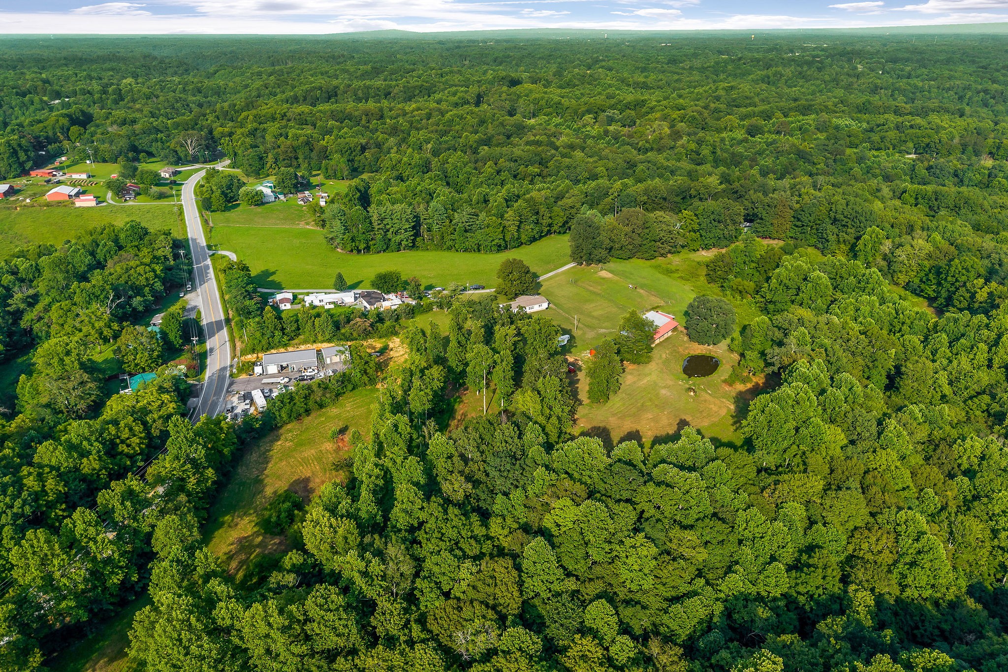227 B A R Road Baxter, TN 38544 - Photo 50 of 52 a view of a big yard with lots of green space and trees