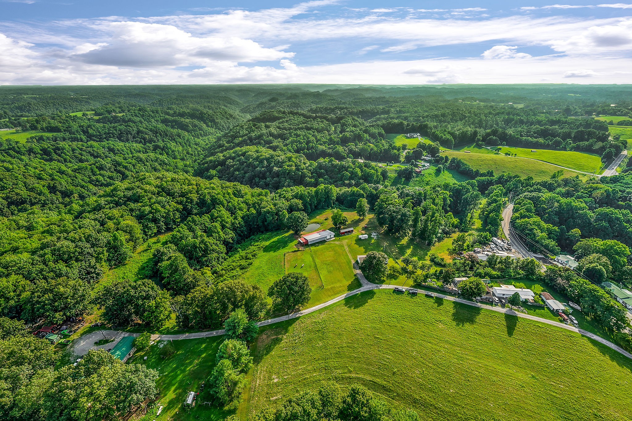 227 B A R Road Baxter, TN 38544 - Photo 51 of 52 a view of a garden with a building in the background