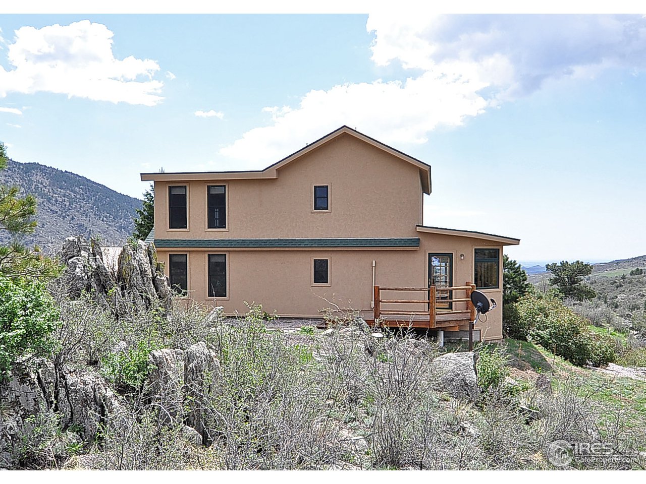 439 Redtail Ridge Way Bellvue, CO 80512 - Photo 18 of 25 a house view with a outdoor space