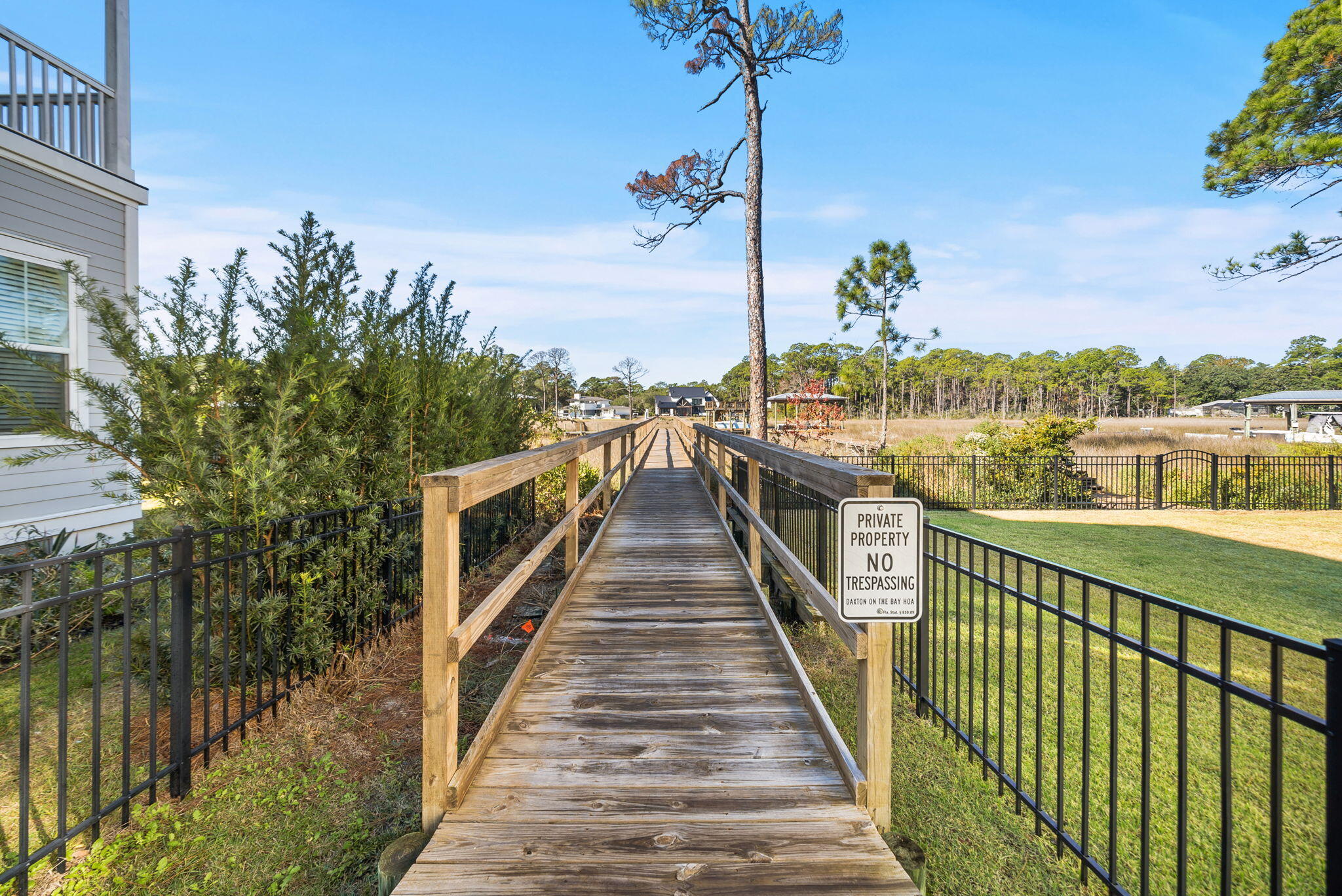 80 Bayou Edge Landing Santa Rosa Beach, FL 32459 - Photo 58 of 68 a view of a balcony with wooden floor and lake view